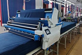 Ra mắt toàn cầu máy trải vải điện đầu tiên